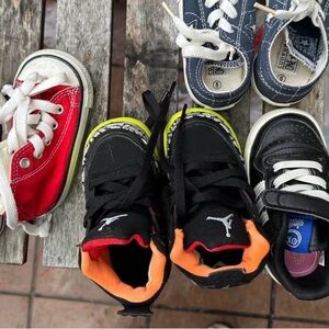 Kids Black and Orange Nike Sneakers